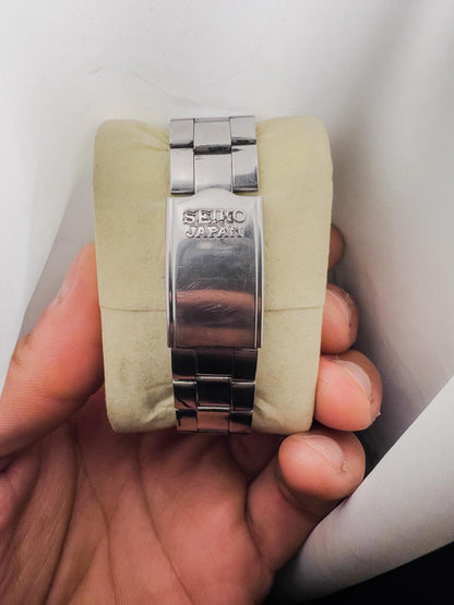 Montre Seiko 5 automatique pour hommes, en acier inoxydable, avec cadran texturé blanc argenté, affichage jour et date