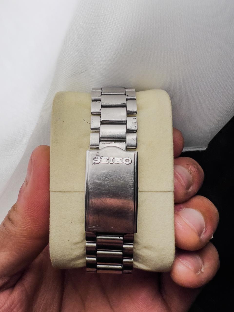 Montre homme Seiko automatique 17 rubis vintage cadran gris anthracite jour-date acier inoxydable
